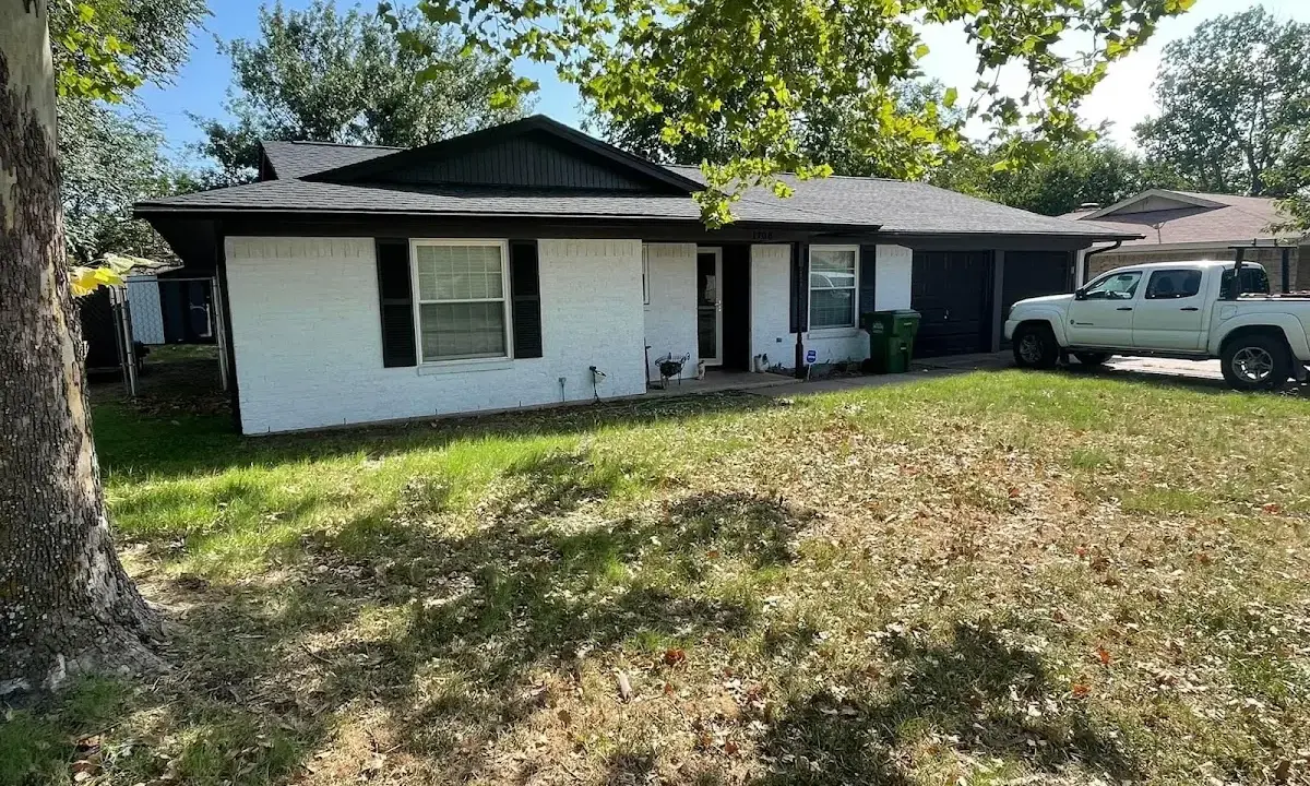 Professional roofing crew working on a residential roof in Park City